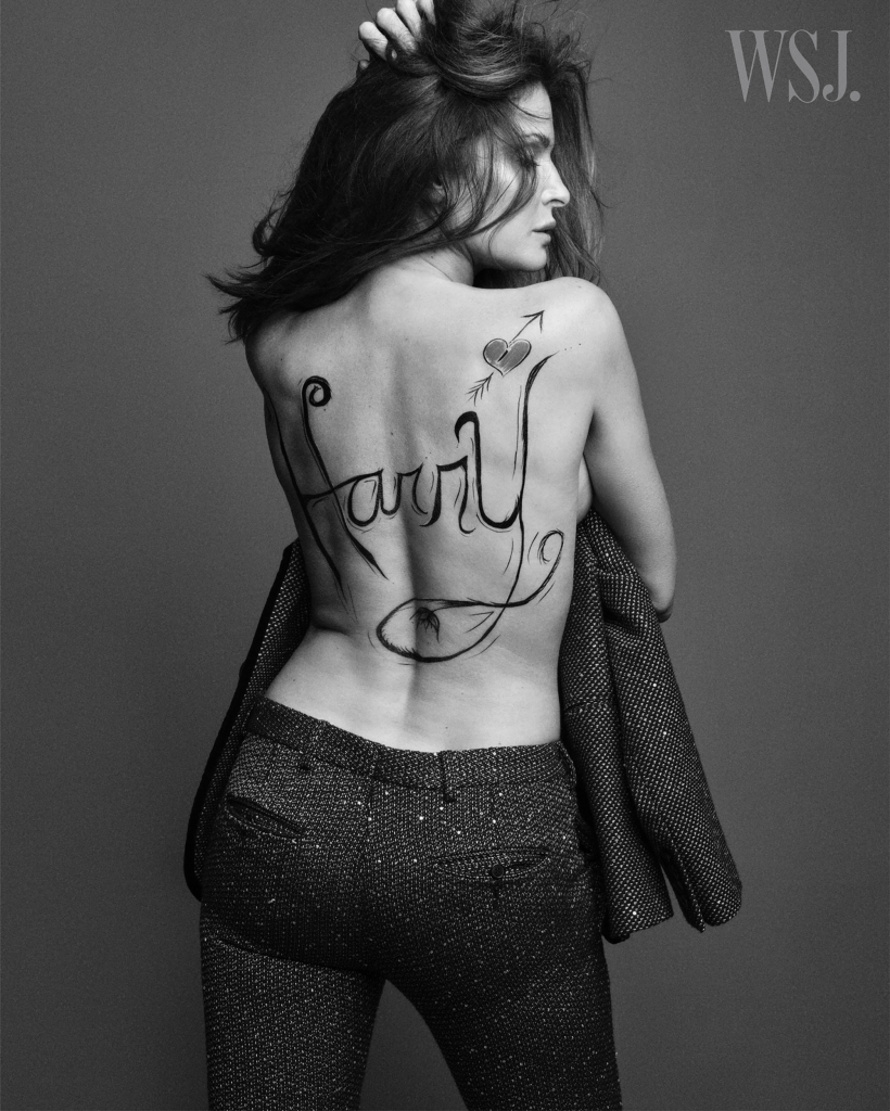 Stephanie Seymour bares her late son's name painted in script on her back. 