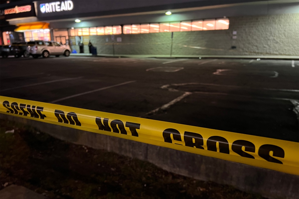 NYPD officers stand outside 3001 mermaid avenue in Coney Island were a 17-year-old was stabbed.