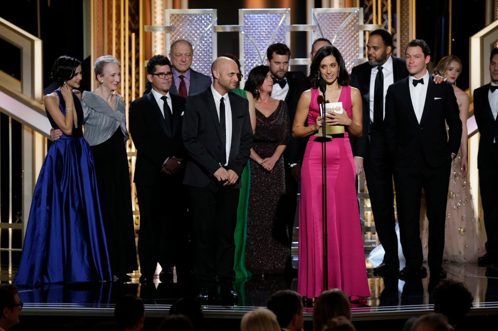 "The Affair" cast standing onstage at the Golden Globes. 