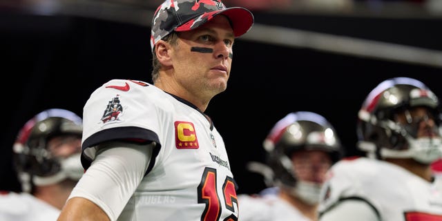 Tom Brady #12 of the Tampa Bay Buccaneers takes the field before kickoff against the Atlanta Falcons at Mercedes-Benz Stadium on January 8, 2023 in Atlanta, Georgia.