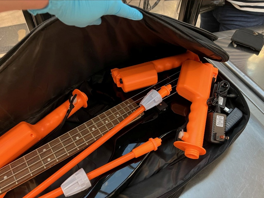 Two electric cattle prods were found packed in with a guitar in a carry-on case at Dulles Airport in September.