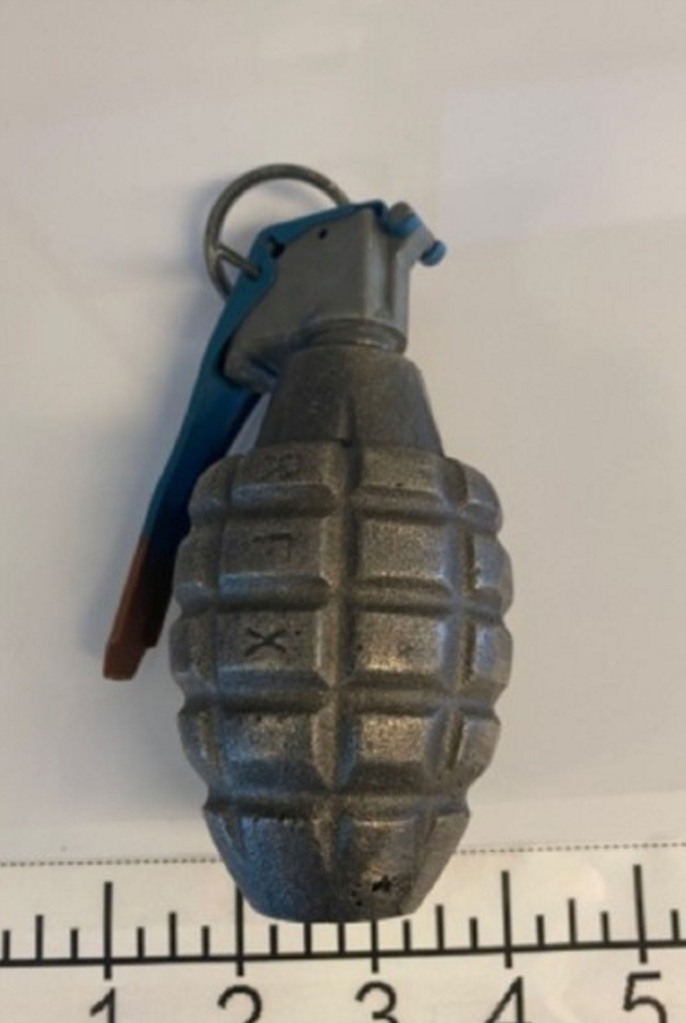 The incident occurred July 29, 2022, when a Transportation Security Officer identified an image on the X-Ray of an item that appeared to be a grenade. The passenger was asked to explain and informed officers that he had purchased a replica grenade for his son while at the Oshkosh Air Show.