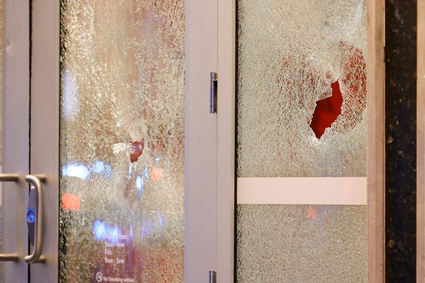 Broken windows at a Wells Fargo branch are seen following a protest, Saturday, Jan. 21, 2023, in Atlanta, in the wake of the death of an environmental activist killed after authorities said the 26-year-old shot a state trooper.