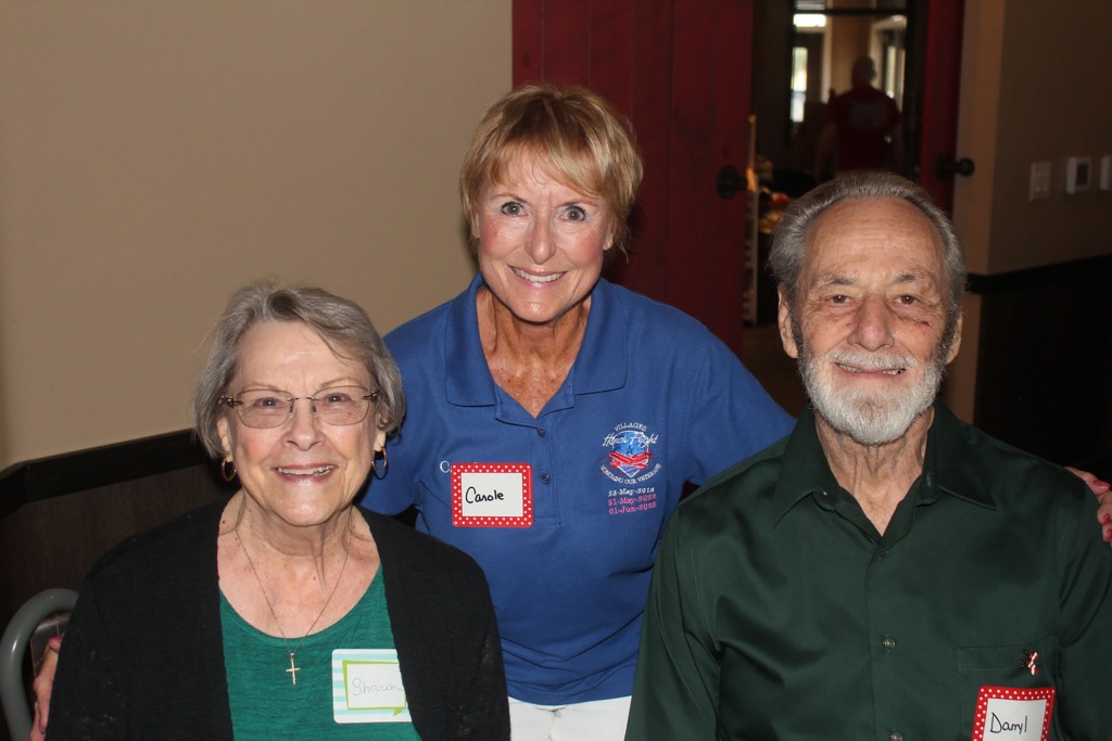 The Getmans, pictured with a friend, had lived in Mount Dora for 20 years.