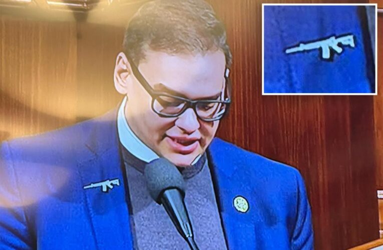 George Santos wears assault rifle lapel on House floor