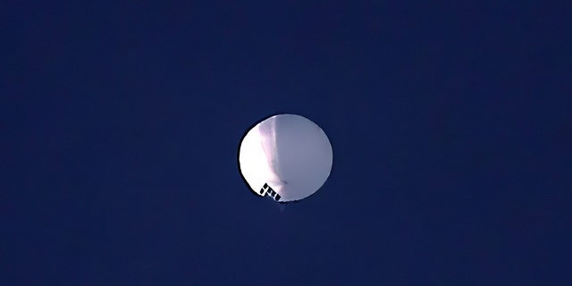 A high altitude balloon floats over Billings, Mont., on Wednesday, Feb. 1, 2023.