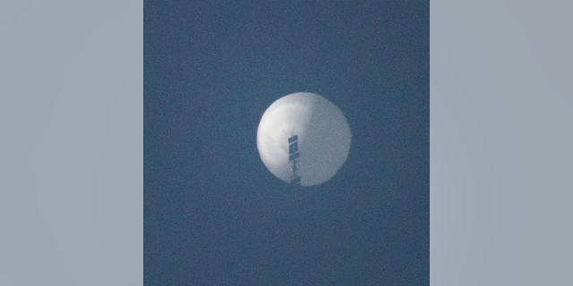 A balloon flies in the sky over Billings, Montana, on February 1, 2023 in this picture obtained from social media.