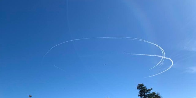 Photos taken in Aynor, South Carolina, of the Chinese spy balloon being shot down.