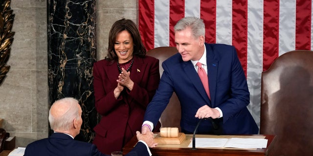 President Joe Biden shakes hands with House Speaker Kevin McCarthy of Calif., as he arrives to deliver the State of the Union address to a joint session of Congress at the U.S. Capitol, Tuesday, Feb. 7, 2023, in Washington.