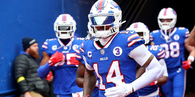 Stefon Diggs, #14 of the Buffalo Bills, runs to the field prior to a game against the New England Patriots at Highmark Stadium on Jan. 8, 2023 in Orchard Park, New York.