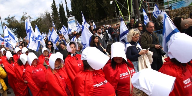 Protesters march against the Israeli government's new judicial reforms in Jerusalem on Monday.