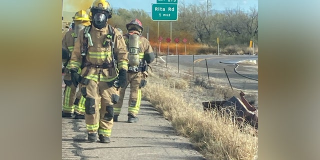 Tucson Fire Hazmat Team working to control a brush fire in Arizona.