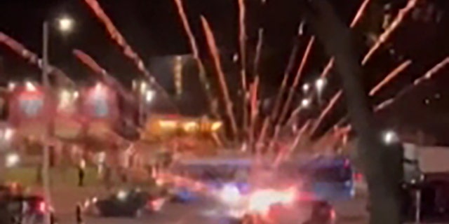 Car clubs set off fireworks in the middle of an intersection during a street takeover on Saturday night. 