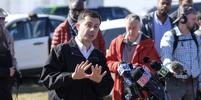 Transportation Secretary Pete Buttigieg speaks during a news conference near the site of the Norfolk Southern train derailment in East Palestine, Ohio, on Thursday, Feb. 23, 2023.