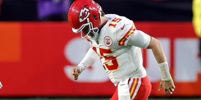 Patrick Mahomes #15 of the Kansas City Chiefs limps off the field after an apparent injury during the second quarter against the Philadelphia Eagles in Super Bowl LVII at State Farm Stadium on February 12, 2023, in Glendale, Arizona.