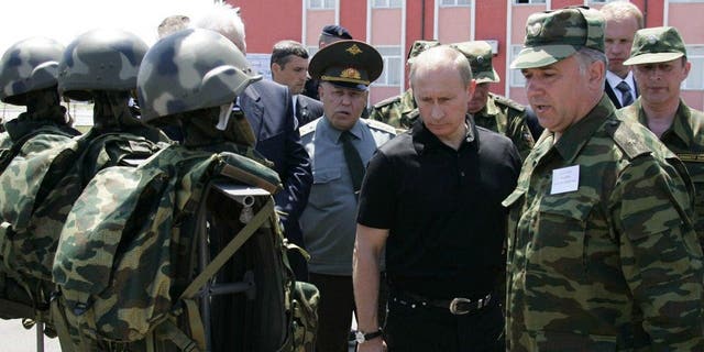 Russian President Vladimir Putin visits a secret service training center near Makhachkala on July 15, 2005.