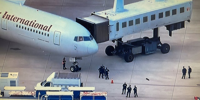 An aircraft, carrying some of the more than 200 political prisoners released from Nicaragua and flown to the United States, sits at a gate at Dulles International Airport in Virginia outside Washington, D.C.