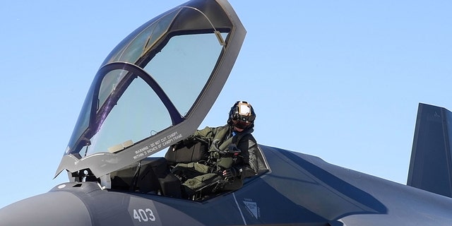 Lt. Suzelle Thomas, a Naval Aviator attached to Strike Fighter Squadron (VFA) 97, exits an F-35C Lightning II after arriving at Luke Air Force Base, Arizona, Feb. 7, 2023.