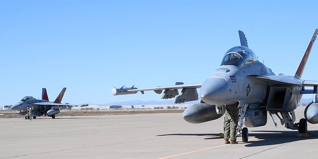 Two EA-18G Growlers, attached to Electronic Attack Squadron (VAQ) 129, arrive at Luke Air Force Base, Arizona, Feb. 7, 2023, in preparation for their flyover of Super Bowl LVII at State Farm Stadium in Glendale on Feb. 12. 