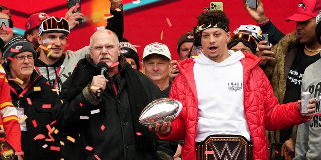 Kansas City Chiefs head coach Andy Reid and Patrick Mahomes, #15, celebrate on stage during the Kansas City Chiefs Super Bowl LVII victory parade on Feb. 15, 2023 in Kansas City, Missouri.