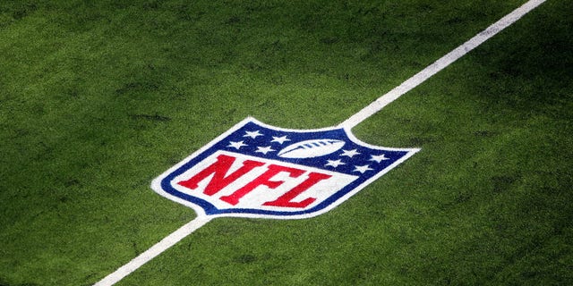 The NFL logo on the field before a game between the Arizona Cardinals and the Los Angeles Rams at SoFi Stadium Oct. 3, 2021, in Inglewood, Calif.