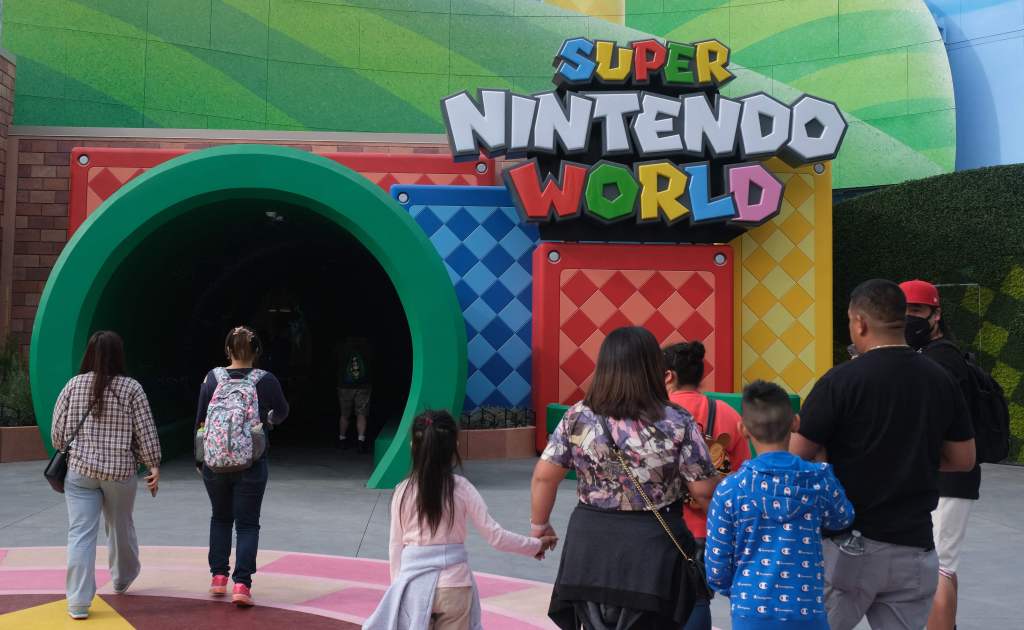 Guests walk towards the entrance during a preview of Super Nintendo World at Universal Studios in Los Angeles, Calif., on Jan. 13, 2023. 