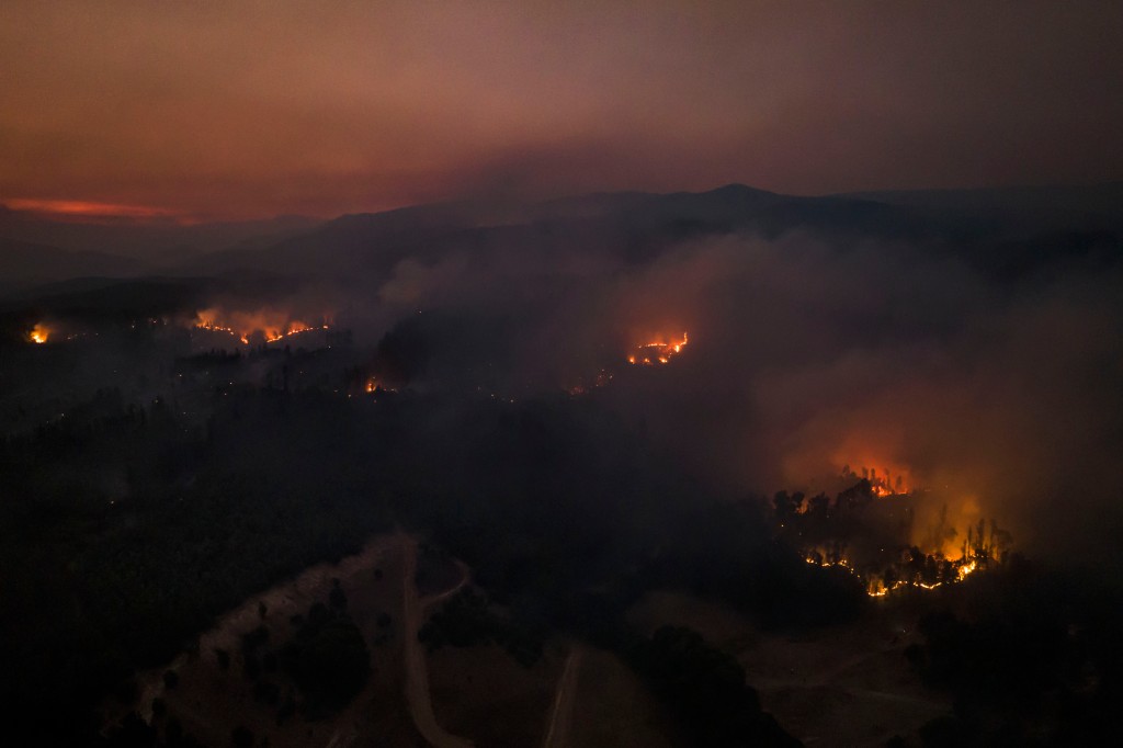 Aerial view of the Araucania region with smoke rising from the wildfires.