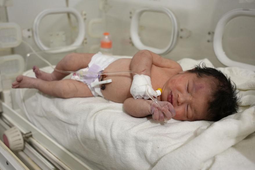 The newborn was discovered with bruises and hypothermia.