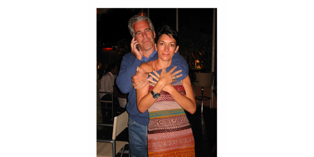 Ghislaine Maxwell and Jefrrey Epstein embrace in an undated evidence photo.