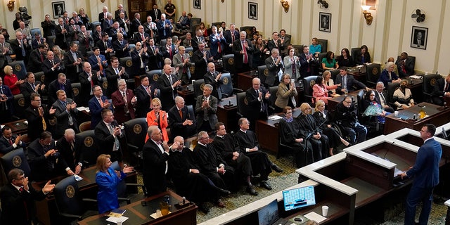 Gov. Kevin Stitt is applauded by members of the legislature during his State of the State address, Monday, Feb. 6, 2023, in Oklahoma City.