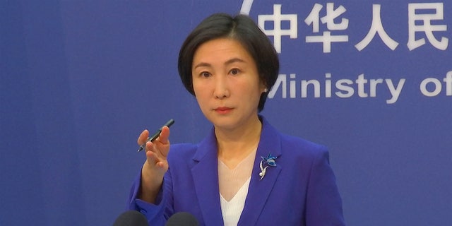 Chinese Foreign Ministry spokesperson Mao Ning gestures during a press conference at the Ministry of Foreign Affairs in Beijing.