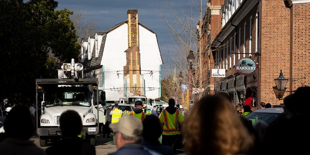 The Bray School is moved down Prince George Street in Williamsburg, Va. on Friday, Feb. 10, 2023. The building is being moved off of the campus of William &amp;amp; Mary and into Colonial Williamsburg. It is believed to be the oldest surviving schoolhouse for Black children in the U.S., built 25 years before the American Revolution. 