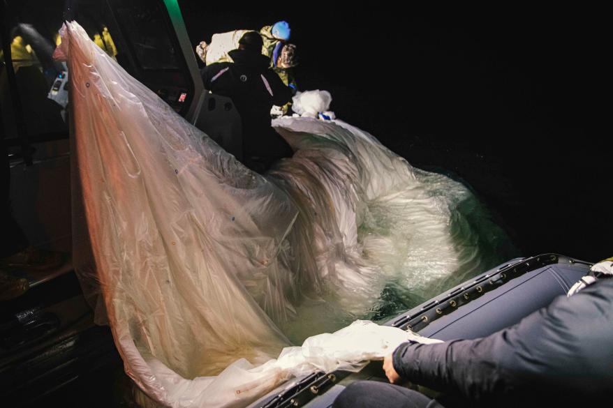 U.S. Navy shows sailors assigned to Explosive Ordnance Disposal Group 2 recovering more pieces of the surveillance balloon off the coast of Myrtle Beach.