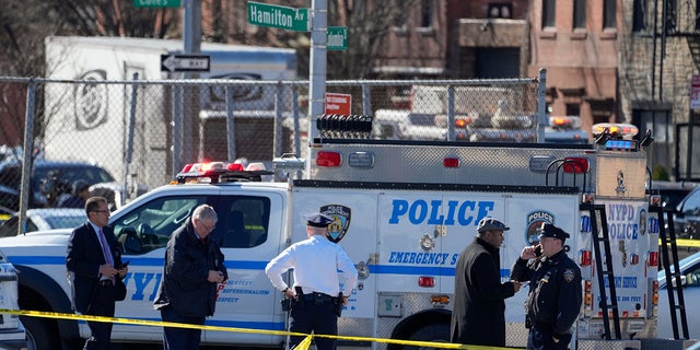 New York Police gather at the scene where a rental truck was stopped and the driver arrested, Monday, Feb. 13, 2023, in New York. Police stopped a U-Haul truck and detained the driver after reports that the vehicle struck multiple pedestrians in New York City on Monday. Authorities say the driver of the truck fled the scene after mounting a sidewalk in the Bay Ridge neighborhood of Brooklyn and injuring several people. 