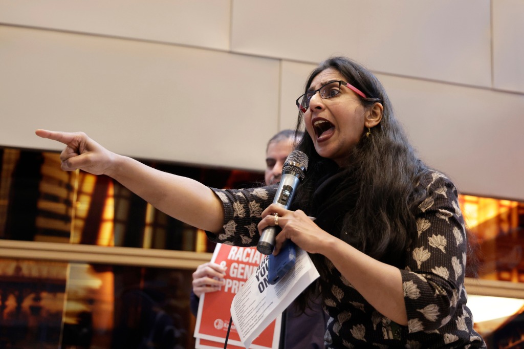 Kshama Sawant speaks to supporters and opponents of a proposed ordinance to add caste to Seattle's anti-discrimination laws at a rally at Seattle City Hall on Feb. 21, 2023, in Seattle. 