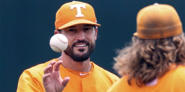 Tennessee head coach Tony Vitello, left, talks with pitcher Kirby Connell before an NCAA college baseball super regional game against Notre Dame, June 11, 2022, in Knoxville, Tenn. Tennessee suspended Vitello, Friday, Feb. 24, 2023, for the Volunteers' weekend series with Dayton while university officials, Vitello and the NCAA handle a violation in the program. 