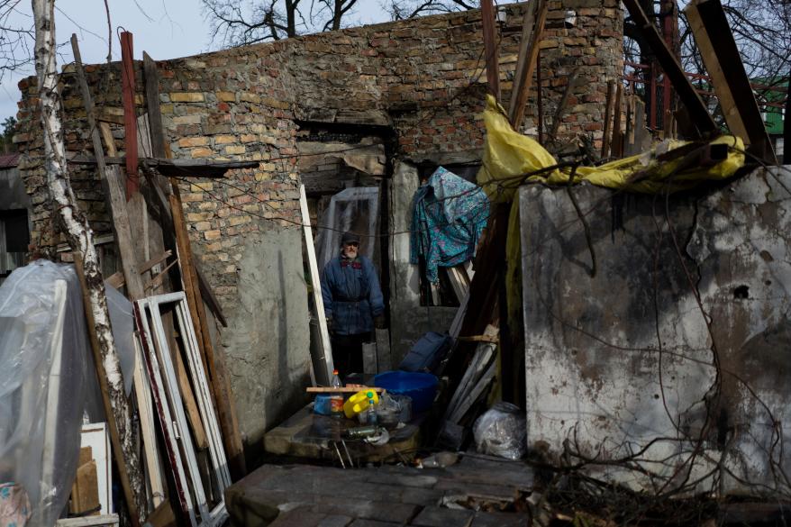 A man in his damaged house in Irpin, Ukraine on February 26, 2023.