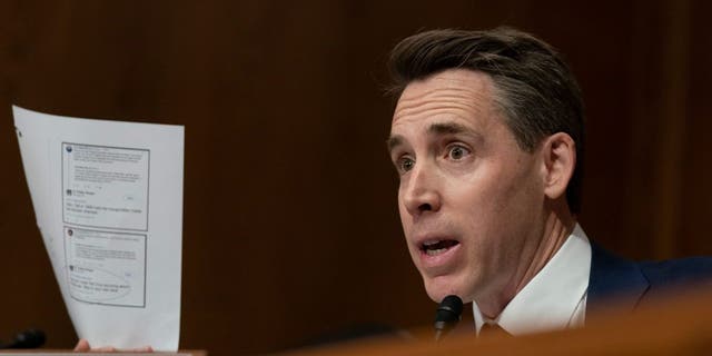 Sen. Josh Hawley, R-Mo., questions Colleen Shogan, nominee to be archivist of the U.S. National Archives and Records Administration about her social media postings, during the Senate Homeland Security and Governmental Affairs Committee full committee hearing on Shogan's nomination on Capitol Hill in Washington, Tuesday, Feb. 28, 2023.