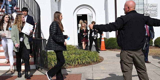 The Colleton County Courthouse is evacuated during Alex Murdaugh’s double murder trial in Walterboro, S.C., Wednesday, Feb. 8, 2023.