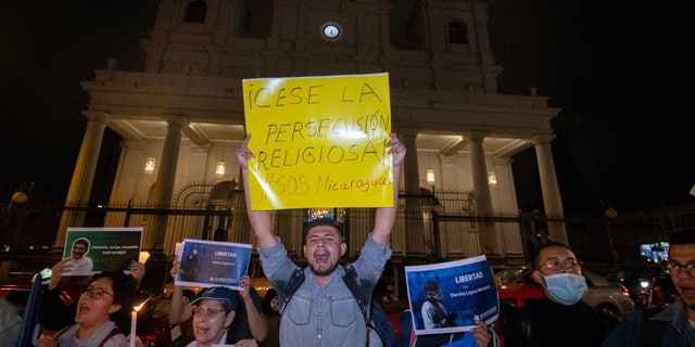 Nicaraguan citizens hold a demonstration in front of San Jose's Cathedral in Costa Rica to protest against the Nicaraguan government and the detention of Nicaraguan bishop and regime critic Rolando Alvarez, in San Jose, on Aug. 19, 2022.