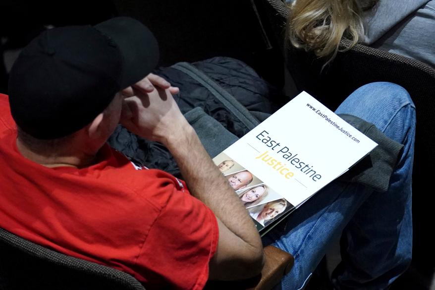 An East Palestine resident listens as activist Brockovich speaks during a town hall meeting at East Palestine High School on Feb. 24, 2023.