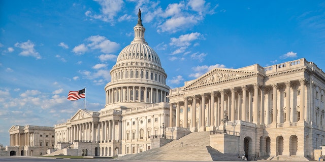 The east side of the US Capitol in the early morning. Senate Chamber in the foreground.