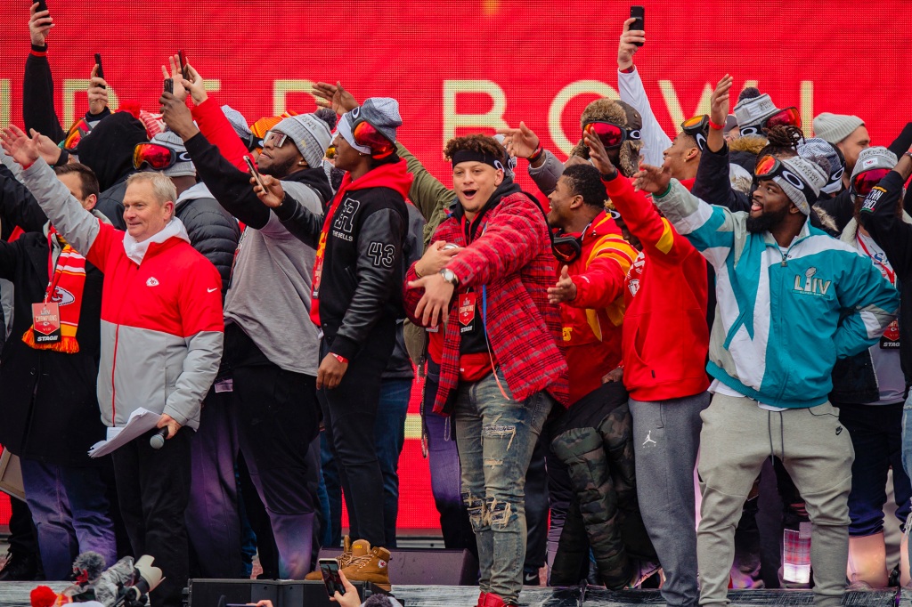 Patrick Mahomes and other Kansas City Chiefs players do the tomahawk chop during the Kansas City Chiefs Victory Parade on Feb. 5, 2020 in Kansas City, Missouri.