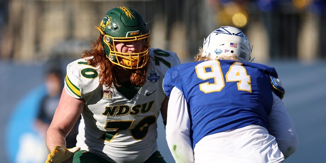 Cody Mauch of North Dakota State blocks against South Dakota State at Toyota Stadium on Jan. 8, 2023, in Frisco, Texas.