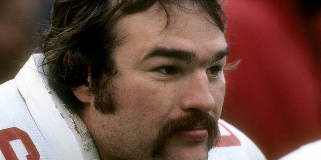 Conrad Dobler #66 of the St. Louis Cardinals watches the action from the bench during an NFL football game circa 1977. Dobler played for the Cardinals from 1972-77.