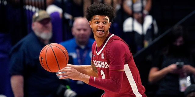 Alabama forward Darius Miles looks to pass in the second half an NCAA college basketball game against LSU in Baton Rouge, Louisiana, March 5, 2022. 