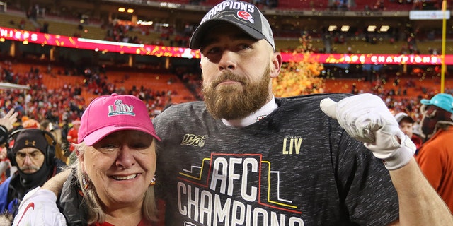 Kansas City Chiefs tight end Travis Kelce (87) and his mother Donna fight back tears of joys after the AFC Championship game between the Tennessee Titans and Kansas City Chiefs on January 19, 2020 at Arrowhead Stadium in Kansas City, MO.