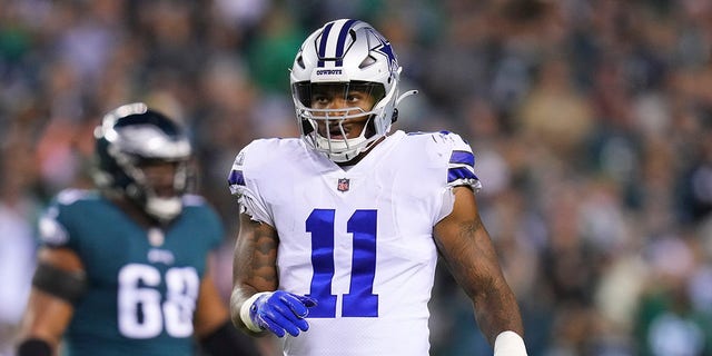 Micah Parsons #11 of the Dallas Cowboys looks on against the Philadelphia Eagles at Lincoln Financial Field on October 16, 2022 in Philadelphia, Pennsylvania.