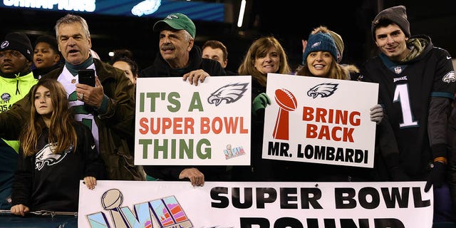 Philadelphia Eagles fans hold signs celebrating the Eagles win over the San Francisco 49ers in the NFC Championship Game at Lincoln Financial Field on January 29, 2023, in Philadelphia, Pennsylvania. Philadelphia defeated San Francisco 31-7. 