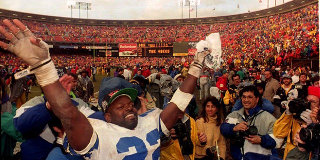 Dallas Cowboys running back Emmitt Smith reacts at Candlestick Park Jan. 17, 1993, after a victory in the NFC championship game against the San Francisco 49er's in San Francisco.